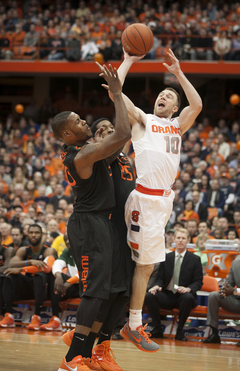 Cooney attempts to draw a foul while shooting. 