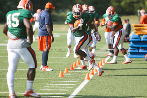 Ashton Broyld (center) can bring a much-needed big play threat to the Syracuse offense at running back. However, no SU ballcarrier has stood out to coaches as the team heads into its opener.  