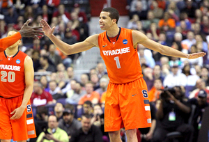 Syracuse point guard Michael Carter-Williams led the Big East with 7.3 assists per game. He's a projected lottery pick in June's NBA Draft.