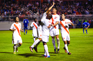 Syracuse celebrates on the field after defeating Hartwick 2-0 at SU Soccer Stadium.