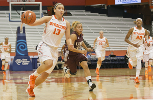 Brianna Butler makes her way to the basket. The Syracuse guard scored a game-high 23 points in the Orange's rout.