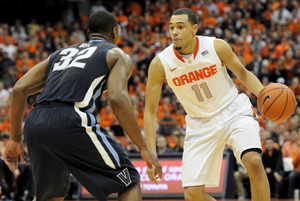 Tyler Ennis looks to drive against Villanova's James Bell. Ennis finished with 20 points as the Orange came back to knock off the previously undefeated Wildcats