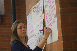 K.C. Albey, a 350.org field organizer, talks with students about campaign strategies and semester goals for divestment.