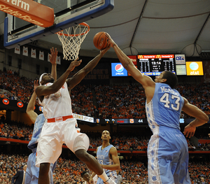 <strong>C.J. Fair</strong> rises for a reverse dunk in Syracuse's 57-45 win over North Carolina on Saturday. Fair finished with a game-high 20 points and 12 rebounds.