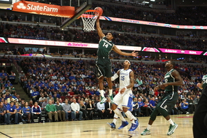 Gary Harris and No. 3 Michigan State look to derail No. 21 Michigan's recent wave of success. Both the Spartans and Wolverines are undefeated in Big Ten play. 