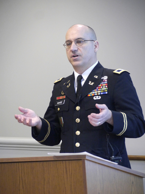 Col. James McKee speaks at the Syracuse University College of Law Wednesday about the Bilateral Security Agreement. The agreement would have U.S. troops advise and train Afghanistan's security forces. 