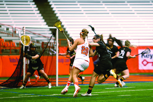 Gabby Jaquith moves toward the goal and Towson goaltender Kelsea Donnelly in Syracuse's 12-7 win ob Saturday. Donnelly had a strong performance albeit in a losing effort. 