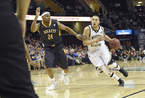 David Brown (right) has overcome many injuries throughout his basketball career, and now leads the Broncos into the NCAA Tournament as the team's leading scorer. 