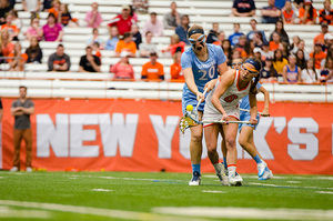 Natalie Glanell fights for possession of the ball against Molly Hendrick.