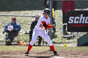 Freshman catcher Nicole Lundstrom watches a pitch go by on Sunday. The Orange dropped both games of a doubleheader to N.C. State, its first two home games of the season. 