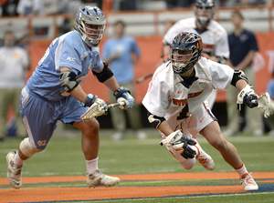 Chris Daddio comes out a faceoff with the ball to start a Syracuse possession. The senior specialist won 12-of-15 faceoffs to finish the game and lead the Orange to a big win over No. 4 North Carolina. 