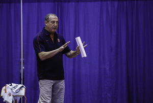 Leonid Yelin coaches his Syracuse women's volleyball team during the Big Orange tournament on Saturday.