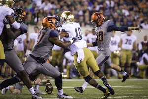 Cole Murphy winds up for a field goal in Syracuse's loss to Notre Dame on Saturday. The freshman walk-on started at kicker over junior Ryan Norton, after previously only taking kickoffs. 