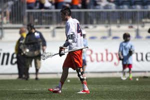 Syracuse attack Randy Staats is ineligible to compete in the fall, head coach John Desko said, but he can still practice with the Orange. Here, Staats walks off the field after SU's loss to Notre Dame in the ACC tournament championship.