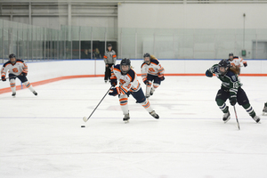 Though she has to think and study more now, Syracuse's Alysha Burriss has had little trouble adjusting to college hockey.