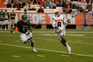 Hakeem Lecky makes a move against Siena on Saturday afternoon in the Carrier Dome. The senior midfielder led a unit that provided a second offensive dimension too hard for the Saints to defend.