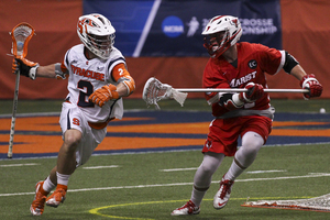 Kevin Rice comes around the goal. He had a career-high nine points in SU's win over Marist on Sunday. 