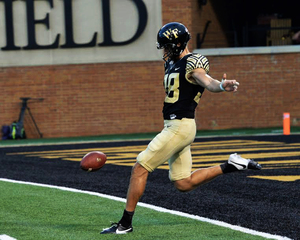 WFU's Alexander Kinal booted a 70-yard punt in the Demon Deacons' season-opener against Elon.