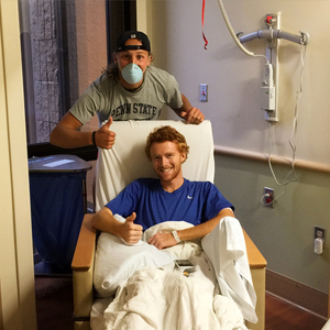 Ryan Urie (bottom) and Billy Cvecko pose in Urie's room at Kaiser Permanente Medical Center in San Diego. Urie was diagnosed with acute myeloid leukemia less than three weeks ago.