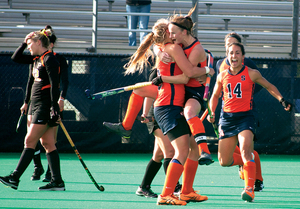 Emma Russell jumps into the arms of a teammate celebrating a goal against Princeton on Oct. 18, helping Syracuse get off to a 15-0 start.