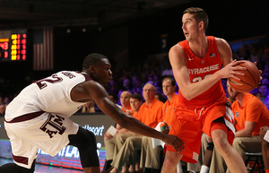 Syracuse jumped to No. 14 in the AP poll after beating Connecticut and Texas A&M in Atlantis, and will look to carry its hot shooting hand into the Wisconsin game Wednesday. 