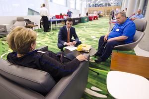 (From Left) Rose Marie Diana, Zachary Johnson and James Diana meet in Dineen Hall during the previous Valor Day on the Syracuse University campus.