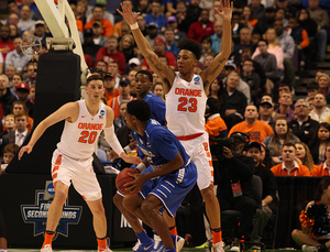 Tyler Lydon (20) and Malachi Richardson (23) contributed four of Syracuse's 13 steals so far in the NCAA Tournament. The zone has suffocated Dayton and MTSU's offenses. 