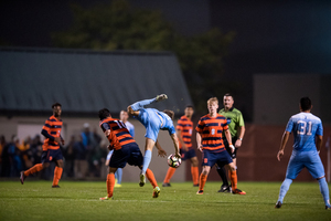 The rain caused players to run into each other, slip and turn the ball over all game.