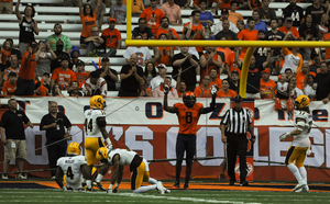 Steve Ishmael signals touchdown standing close to the endzone in Syracuse's 41-17 win over Central Michigan. He finished that game with eight catches and 139 yards.