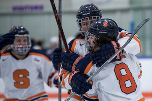 Syracuse celebrates a goal earlier in the season. 