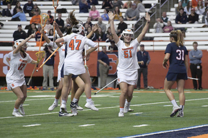 Emily Hawryschuk (51) and Syracuse snuck in off the bubble to make a seventh-straight NCAA tournament.