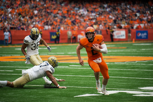 Eric Dungey runs the ball SU's 27-24 win over Pittsburgh last season.