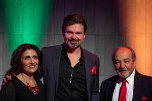 Redhouse Executive Director Samara Hannah (left) and Board President Bill Hider (right) announce Hunter Foster as the new artistic director of Redhouse Arts Center.