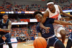 Paschal Chukwu and Old Dominion's Kalu Ezikpe race to the ball.