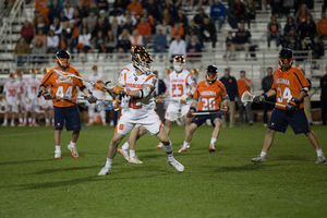 Jamie Trimboli, pictured against Virginia last season, was one of three SU players honored by Inside Lacrosse.