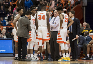 Syracuse huddles in its loss to Buffalo. 