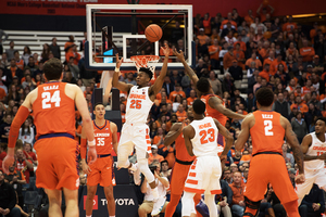 Tyus Battle leaps up for a ball against Clemson.