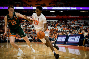 Robert Braswell drives to the lane. Syracuse cruised to an easy win, opening the door for Braswell to earn time on the floor.