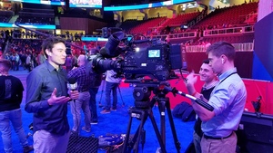 Three Syracuse students broadcasted live from the Super Bowl radio row for a first-ever SU student experience.