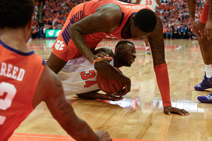 Bourama Sidibe clutches the ball against Clemson earlier this season.