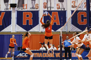 Elena Karakasi sets up a Syracuse kill in a match earlier this season against Virginia. 