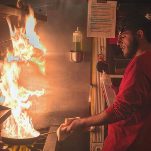 Michael Brooks works 50-60 hours weekly at La Parilla grill and wine bar, but is a personal chef for a group of SU athletes on the side.