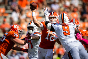 Trevor Lawrence struggled at times against Syracuse, throwing an interception to Garrett Williams and completing just 27-of-43 passes.