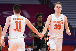 Joe Girard III and Buddy Boeheim both contracted COVID-19 during the Orange's three-week pause.