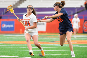 Emma Tyrrell uses an ‘old school’ reverse grip. She leads the team in scoring in SU's last four games. 