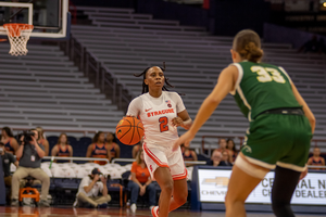 Syracuse escaped with a narrow 73-70 win in its exhibition game against Le Moyne.