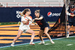 Tyrrell (left) becomes one of just three players in program history to be named a Tewaaraton finalist twice, joining Alyssa Murray and head coach Kayla Treanor.