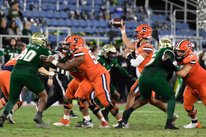 USF capitalized on two Dan Villari interceptions and two scoop-and-score touchdowns to defeat the Orange 45-0 in the Boca Raton Bowl