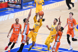 Syracuse held Pitt star freshman Carlton Carrington (pictured, No. 7) to zero points through SU's 69-58 win.