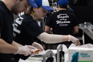 Schoolyard Bagels’ slogan decorates the back of workers’ uniforms as they take and prepare orders. It took Peter Lombardo and his co-owners over four years to find the right location for their shop, he said. They hope that it will be a go-to spot for those in search of early morning or late night meal options. 